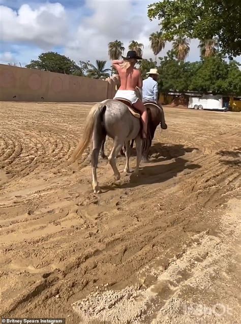 Britney Spears strips topless on horseback ride and makes naked ...